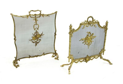 Lot 532 - Two brass and mesh firescreens