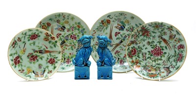 Lot 292 - Four Chinese famillle rose plates with green backgrounds and a pair of turquoise dragon dogs