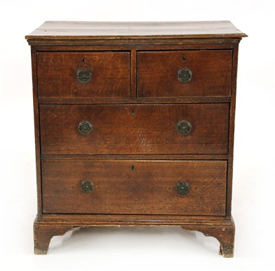 Lot 667 - An early 19th century small oak chest