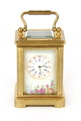Lot 116 - A miniature brass carriage clock