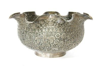 Lot 98 - A late 19th century Burmese embossed silver...