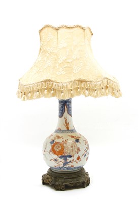 Lot 242 - A Japanese porcelain vase table lamp