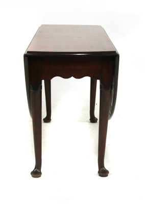 Lot 330 - An 18th century oval mahogany dining table