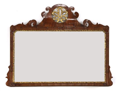 Lot 716 - A walnut overmantel mirror