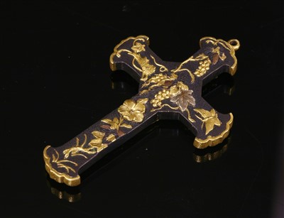 Lot 120 - A Japanese shakudo gilded and mixed metal cross