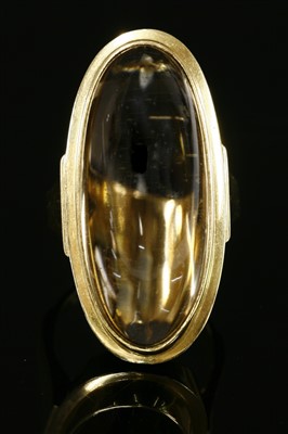 Lot 395 - A Continental gold single stone smoky quartz ring, c.1970