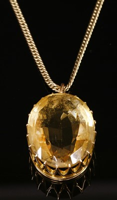 Lot 36 - A single stone gold citrine pendant