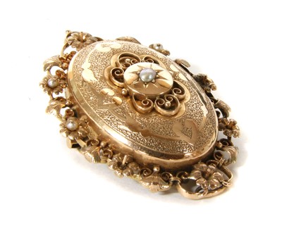 Lot 1041 - A Continental rose gold oval brooch