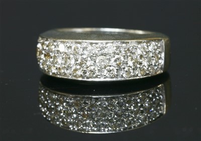 Lot 457 - A 9ct gold pavé set diamond tapered band ring