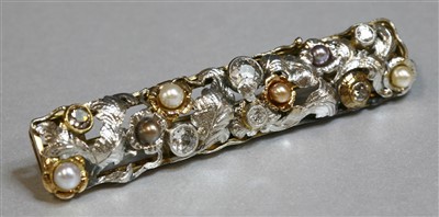 Lot 48 - A Continental two colour gold diamond, fancy diamond and pearl foliate plaque brooch, c.1935-1945