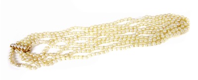Lot 1003 - A four row uniform cultured pearl necklace