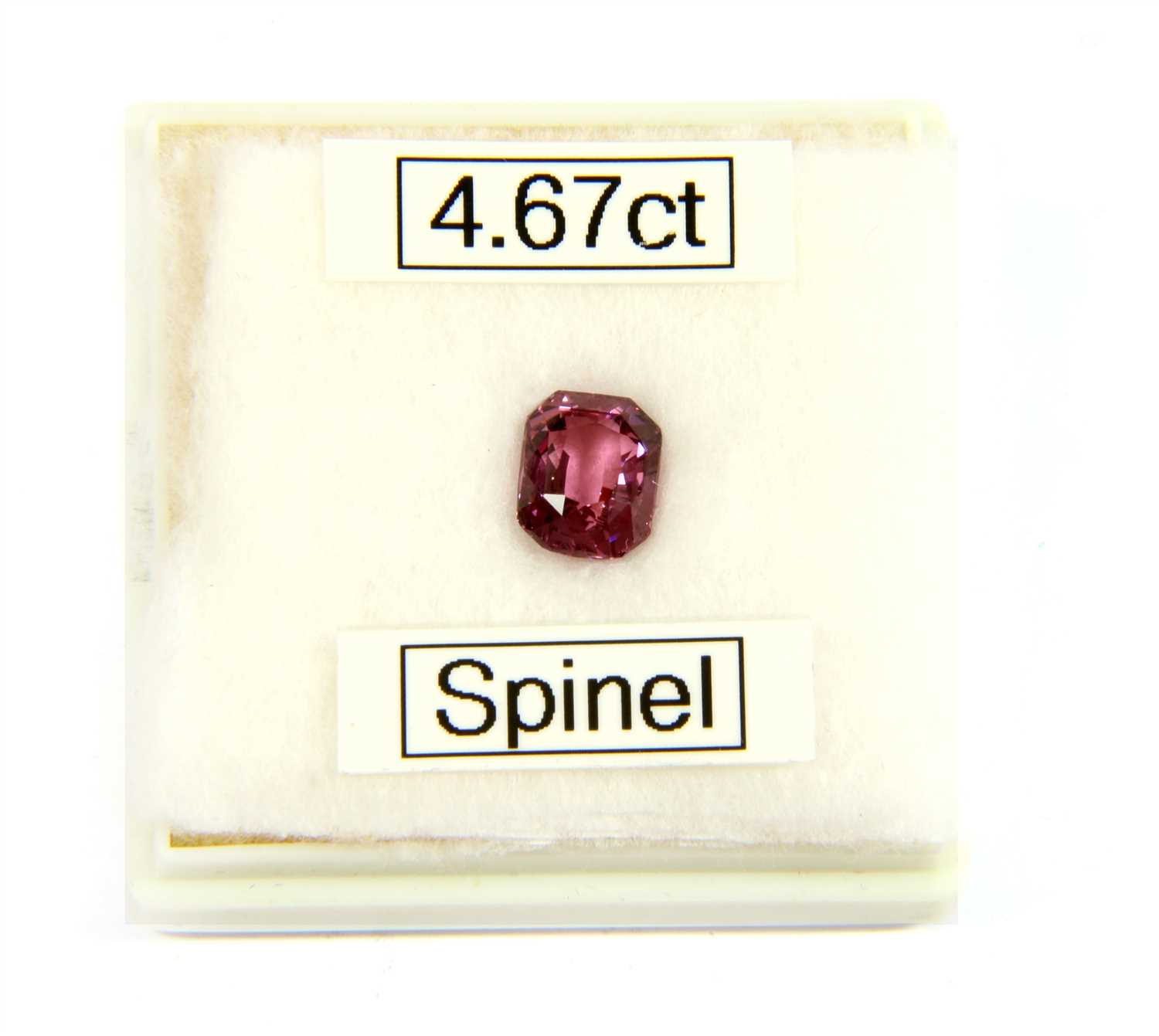 Lot 34 - An unmounted octagonal mixed cut pink spinel