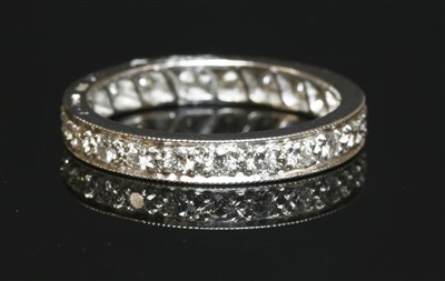 Lot 456 - A platinum diamond set full eternity ring