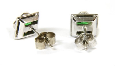 Lot 89 - A pair of 18ct white gold tsavorite garnet and diamond square cluster earrings