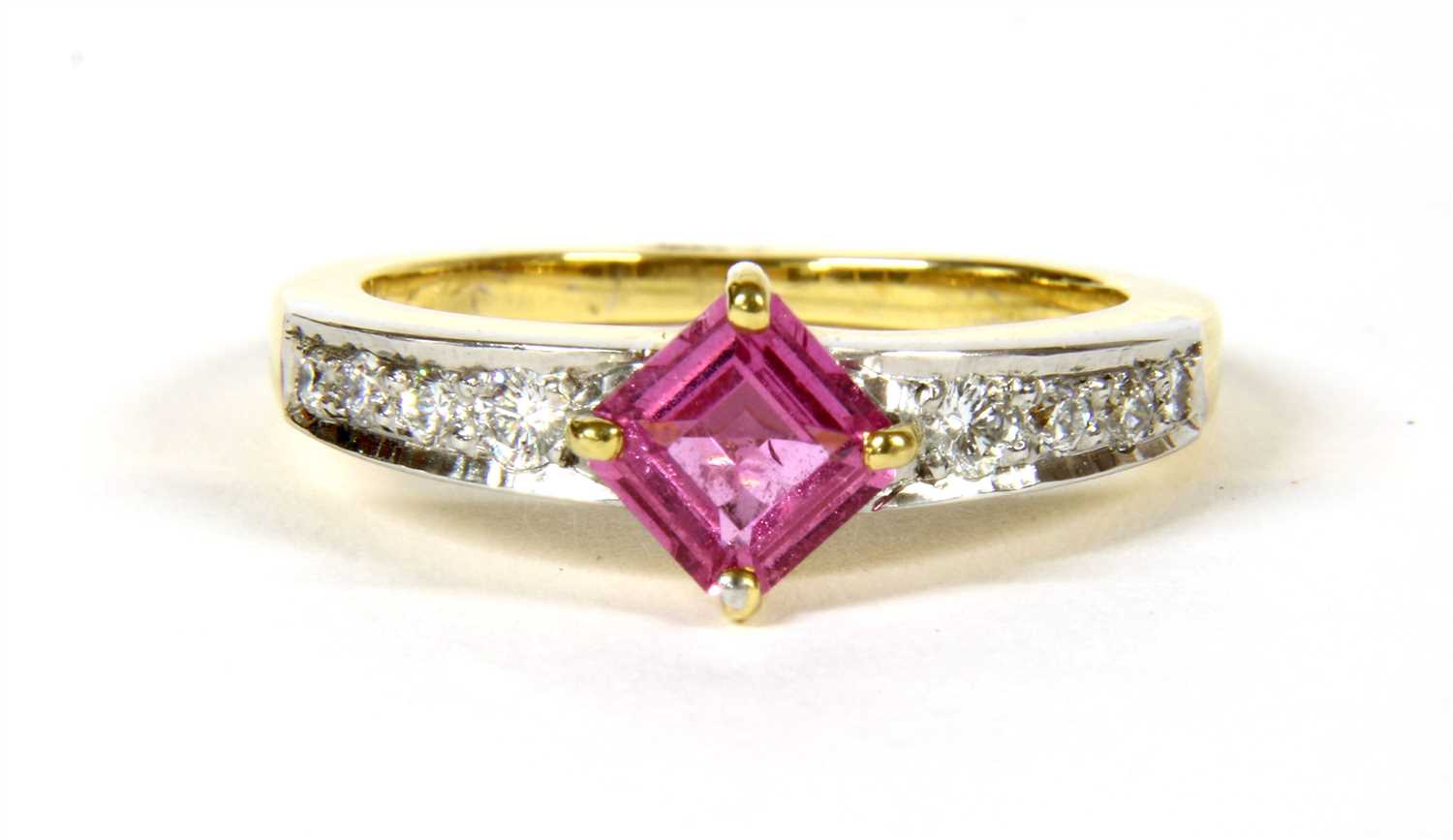Lot 33 - An 18ct two colour gold pink sapphire and diamond ring