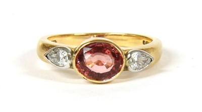 Lot 36 - An 18ct rose gold and white gold single stone orange sapphire ring