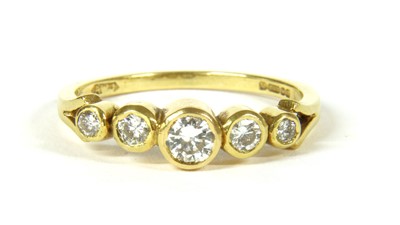 Lot 39 - An 18ct gold five stone diamond ring