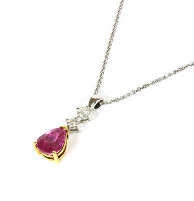 Lot 22 - An 18ct two colour gold pink sapphire and diamond pendant