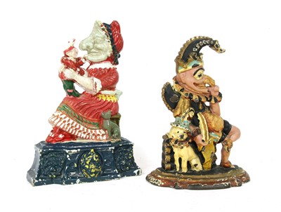 Lot 389 - A near pair of Victorian polychrome painted cast iron Punch and Judy doorstops