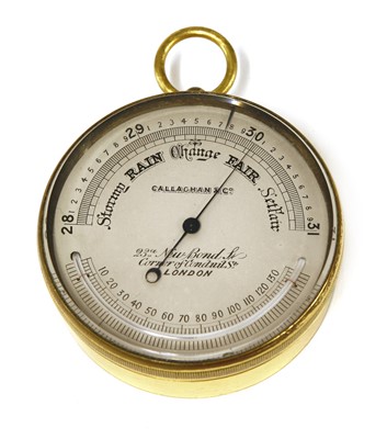 Lot 194 - A brass cased desk barometer