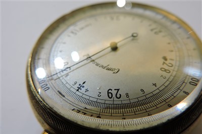 Lot 370 - Four brass-cased pocket barometers