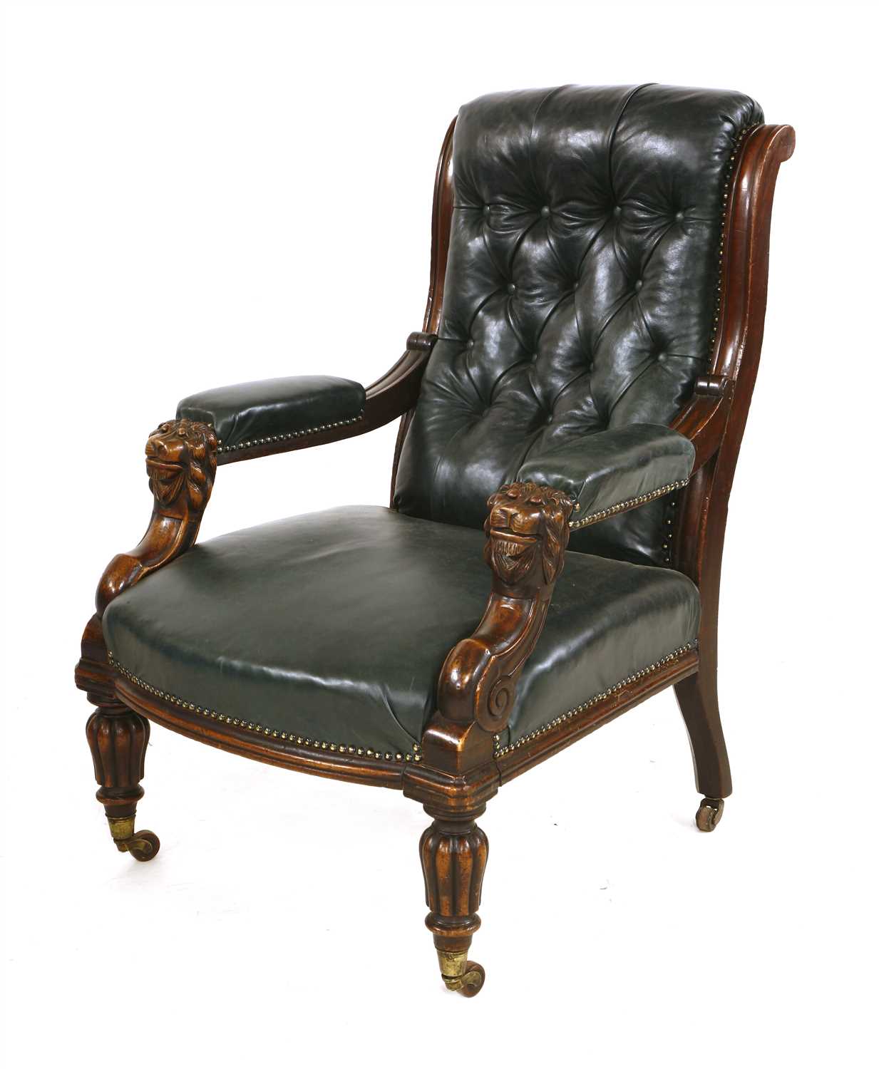Lot 31 - A William IV mahogany and green buttoned leather library chair