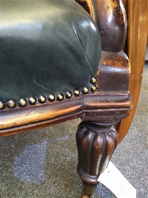 Lot 31 - A William IV mahogany and green buttoned leather library chair