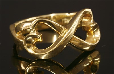 Lot 165 - A gold 'Double Loving Heart' ring, by Tiffany