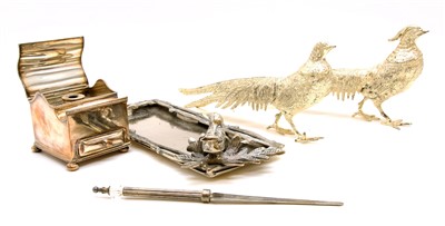 Lot 139 - A silvered inkwell desk stand