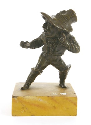 Lot 524 - A bronze figure of a hunchback swordsman