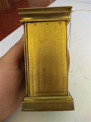 Lot 392 - An unusual brass carriage timepiece