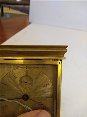 Lot 392 - An unusual brass carriage timepiece