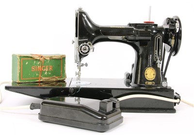 Lot 253 - A Singer 221K portable sewing machine