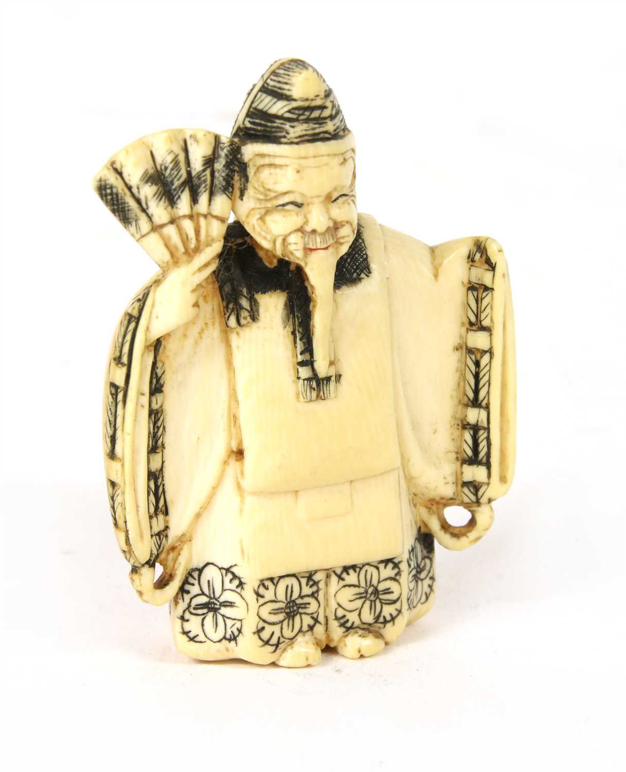 Lot 132 - A Japanese ivory netsuke,