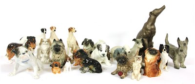 Lot 232 - A collection of ceramic dog figurines