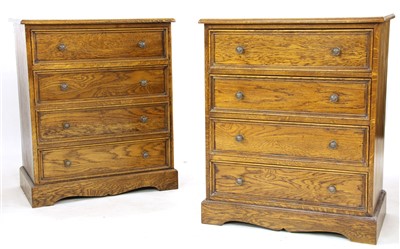 Lot 646 - A pair of 'Clover Oak' chests of four drawers