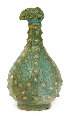 Lot 512 - A Kashan pottery cock-headed ewer