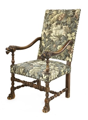 Lot 10 - A Continental beechwood elbow chair