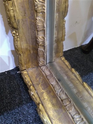 Lot 13 - A large pair of carved and gilded picture frames