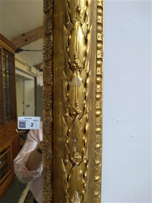 Lot 13 - A large pair of carved and gilded picture frames