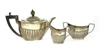 Lot 145 - A late Victorian silver bachelor's three piece tea set of ovoid form