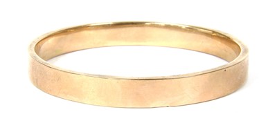 Lot 51 - A 9ct gold hollow flat section bangle