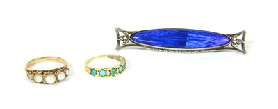 Lot 49 - An 18ct gold and turquoise ring