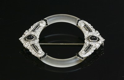 Lot 131 - A French Art Deco platinum, gold, rock crystal, onyx and diamond brooch, c.1925