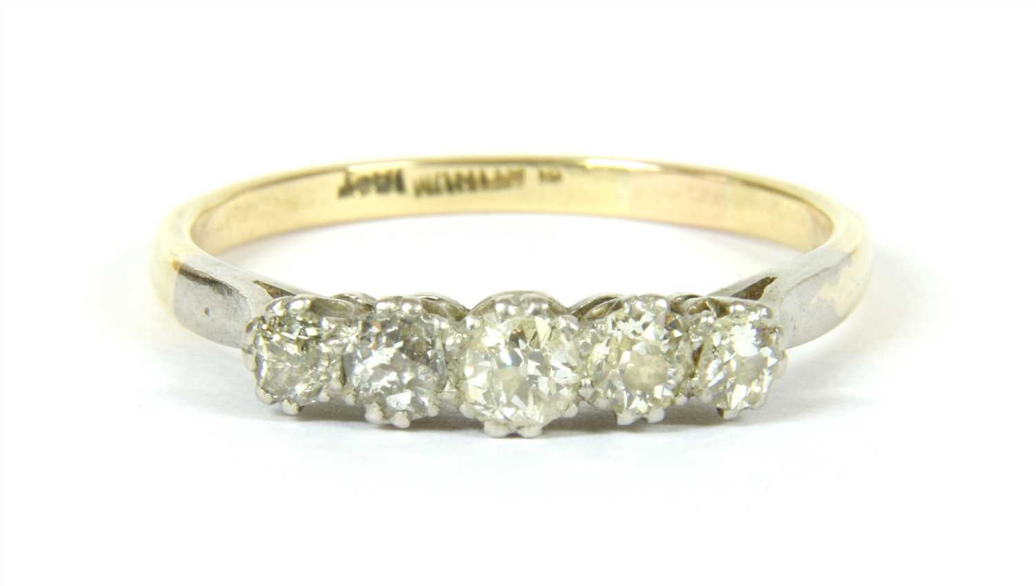 Lot 7 - A graduated five stone diamond ring with Swiss cut diamonds