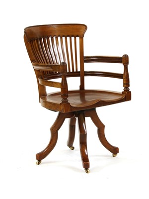 Lot 553 - A late Victorian mahogany office chair