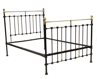 Lot 582 - A Victorian brass and wrought iron double bedstead