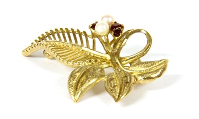 Lot 16 - A 9ct gold cultured pearl and garnet leaf brooch