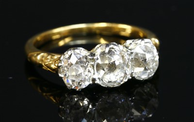 Lot 60 - A three stone diamond ring