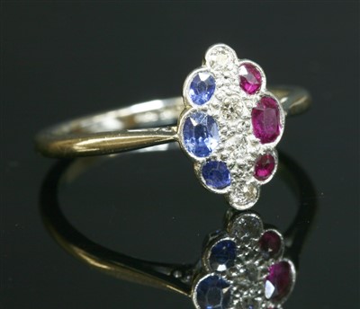 Lot 179 - A diamond, sapphire and ruby marquise-shaped cluster ring, c.1915